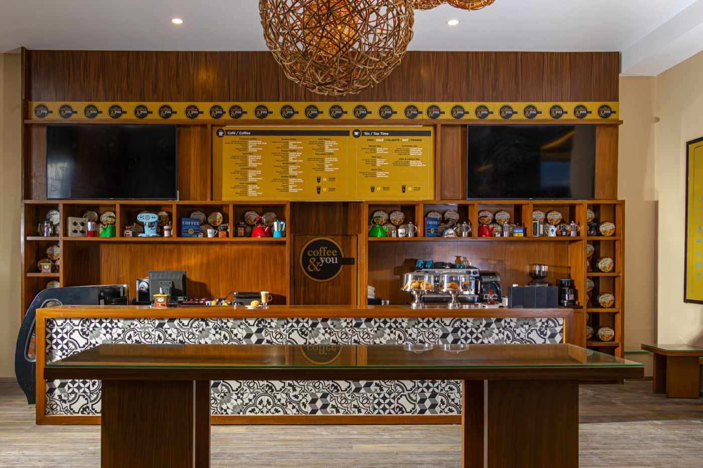 Interior view of Dos Lunas restaurant overlooking the pool at Smart Cancun by Oasis